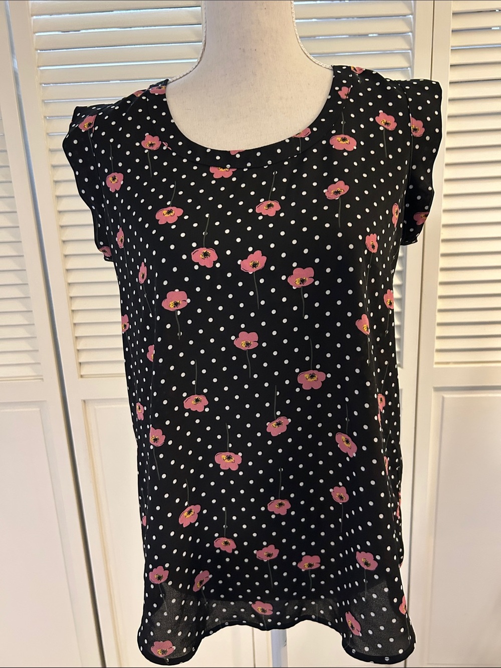 Pleione Black Sleeveless Dot Top with Pink Floral Print